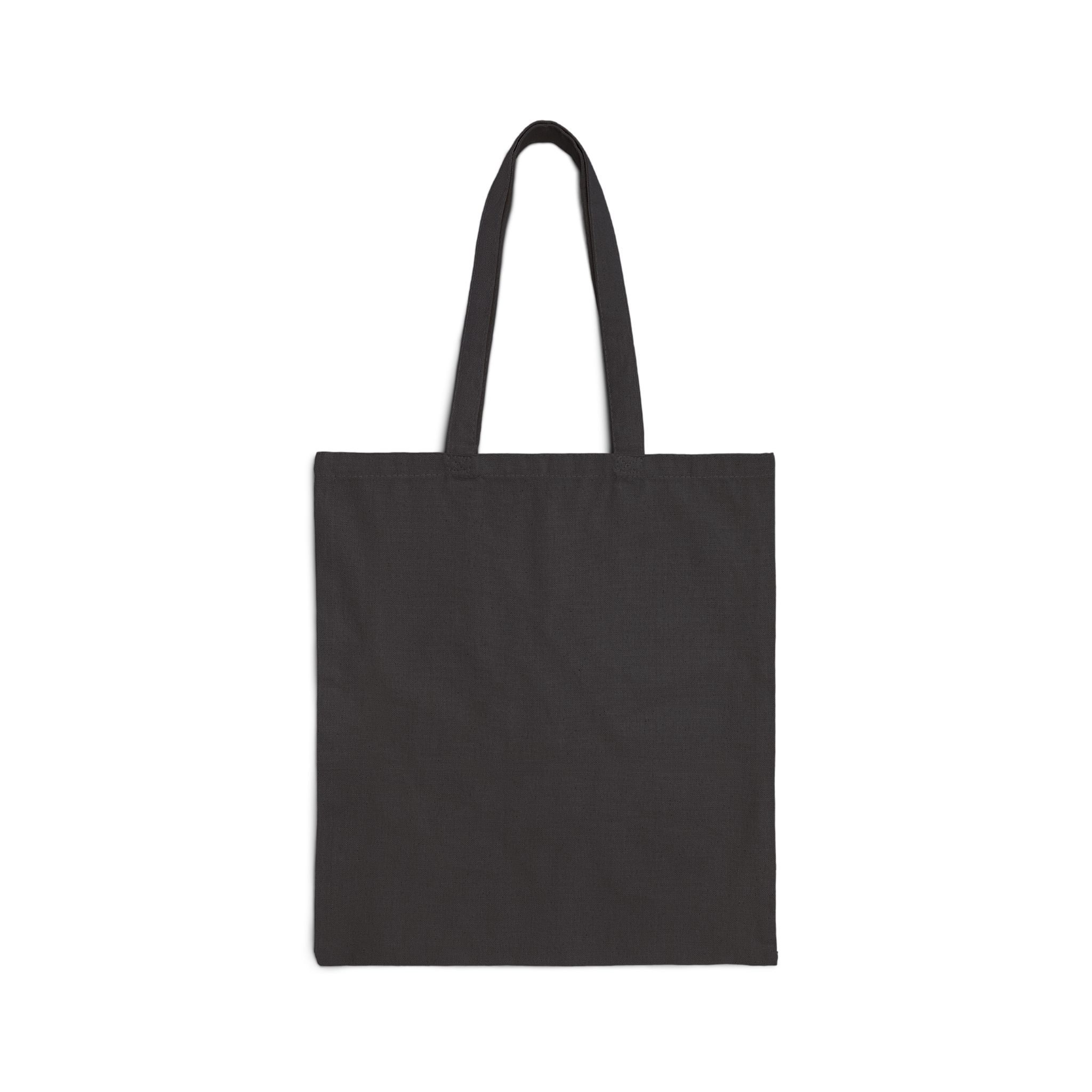 Close-up of school supplies print and custom name on canvas tote bag