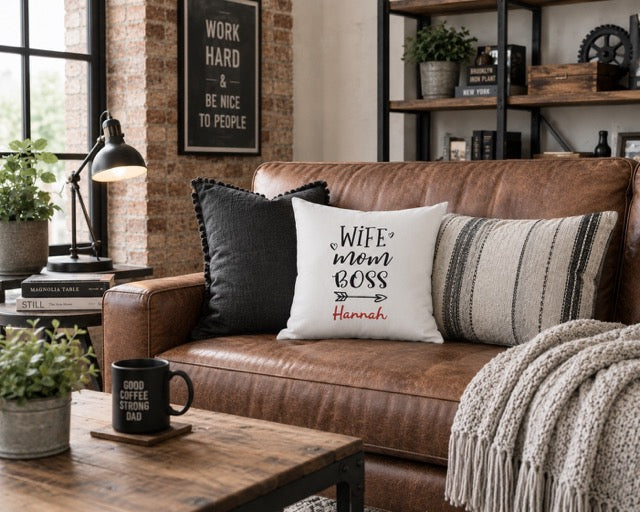 Close-up of Wife Mom Boss pillow print with arrow and custom name